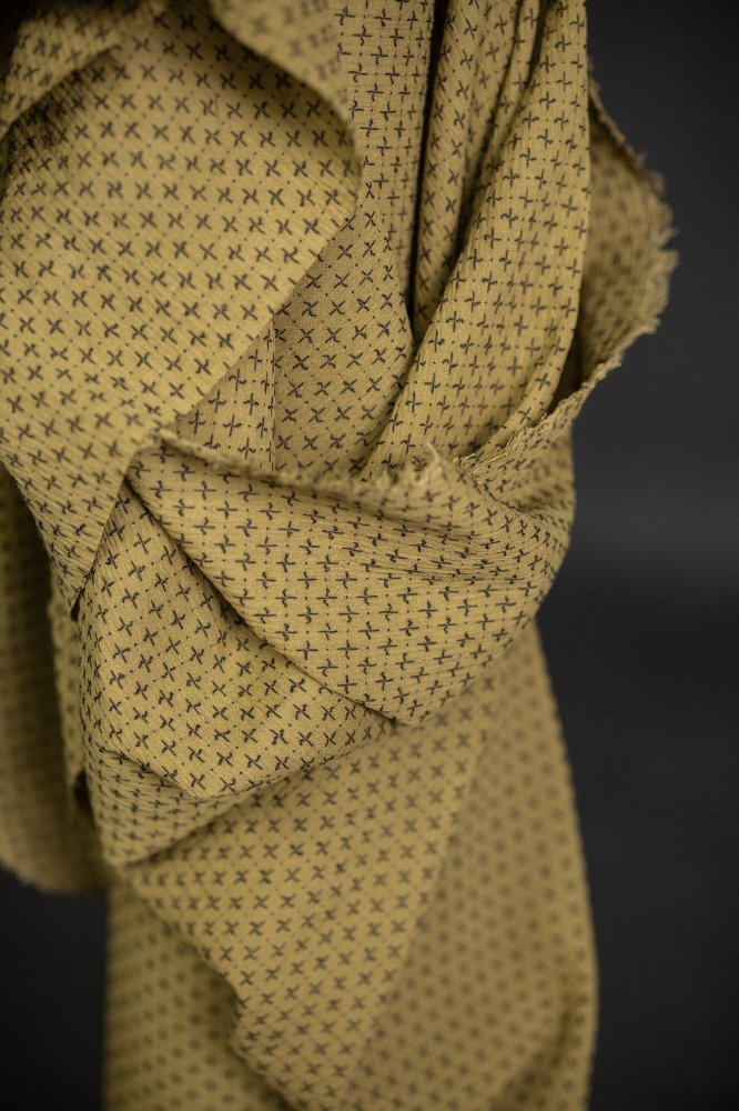 green cross stitch fabric