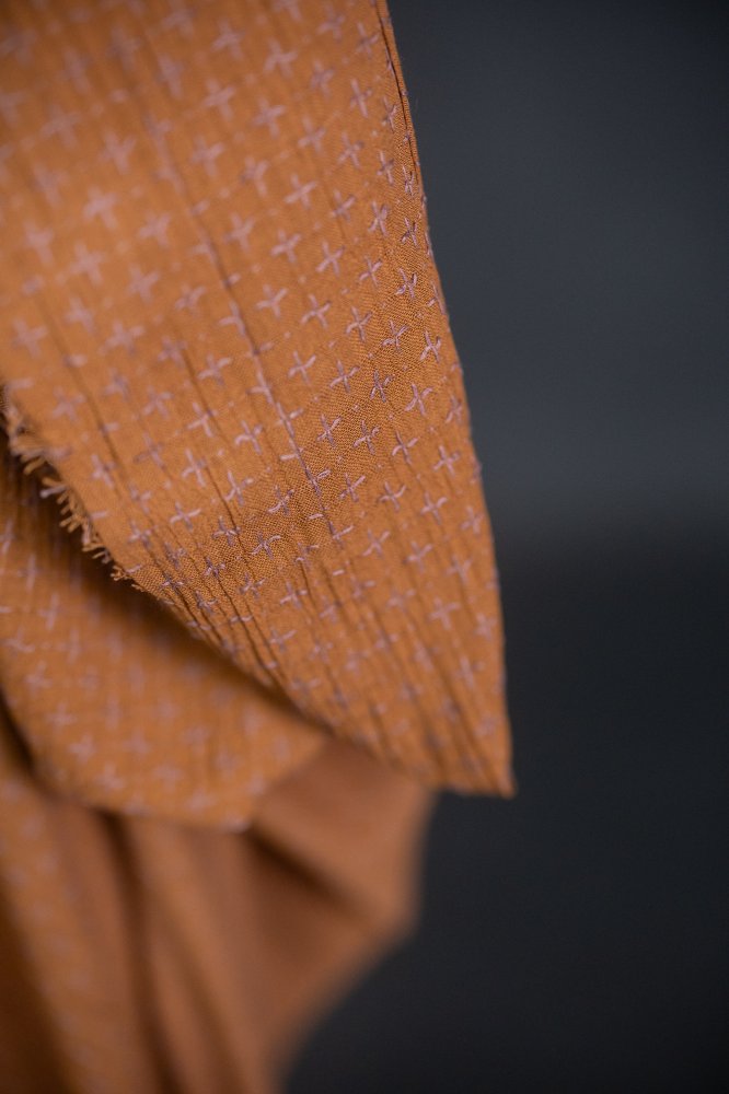 rusty orange cross stitch fabric